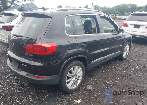 2014 Volkswagen Tiguan Sel z USA, uszkodzony, nr VIN WVGAV3AX3EW508496